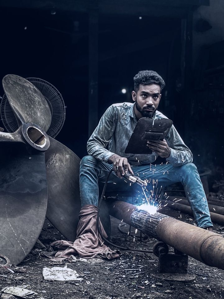 Welder at work in a fabrication yard
